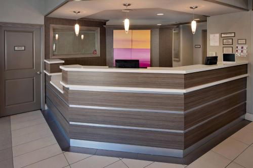 a lobby of a hospital with a reception counter at Residence Inn Fremont Silicon Valley in Fremont
