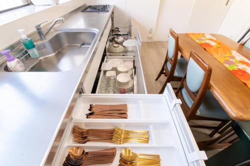 Η κουζίνα ή μικρή κουζίνα στο Bisenoyado Onn -SEVEN Hotels and Resorts-