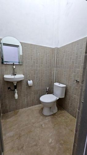 Ένα μπάνιο στο Umah Cenik