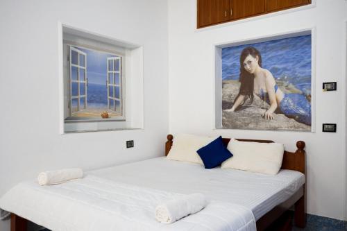 Ein Bett oder Betten in einem Zimmer der Unterkunft HOTEL MORNING STAR Candolim