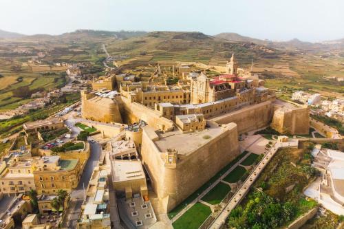 an aerial view of the city of aleppoppoppoppoppoppoppo city at Maisonnette & Pool Ta'Cenc Sannat Gozo - Happy Rentals in Sannat