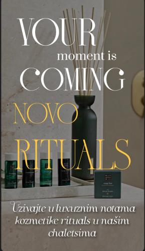 a book cover of your moment is gonna moverothroth with a black vase at Sarajevo Luxury Chalets in Sarajevo