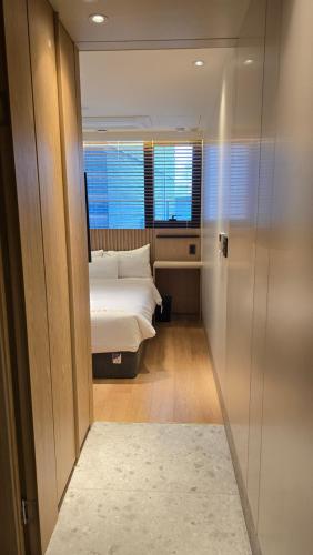 Postel nebo postele na pokoji v ubytování N285Hotel