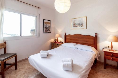 Postel nebo postele na pokoji v ubytování Fener de Dalt 87 apartamento con wifi y piscina