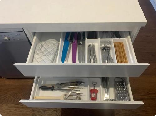 a white drawer with utensils in it at ‘The bayside’ Beautifully brand new house in Mentone