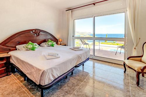 Posteľ alebo postele v izbe v ubytovaní Fener de Dalt 89 Casa con piscina y vistas