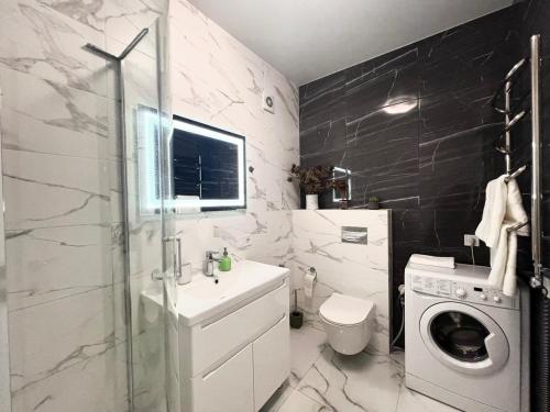 Ванная комната в Apartments VIP AVALON