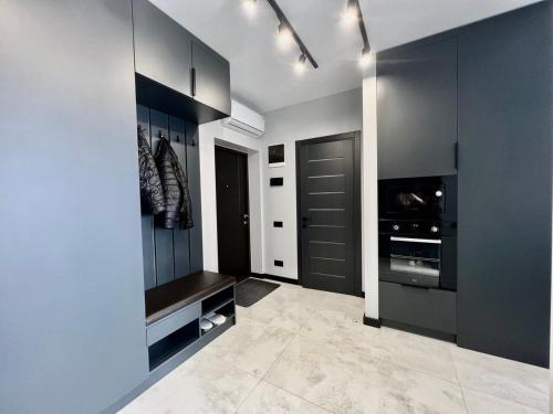 Телевизор и/или развлекательный центр в Apartments VIP AVALON