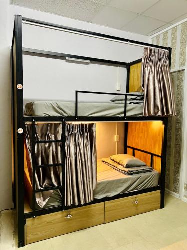 Postel nebo postele na pokoji v ubytování AULE HOSTEl
