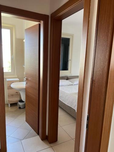 Ένα μπάνιο στο RESIDENCE FIORE ROSSO