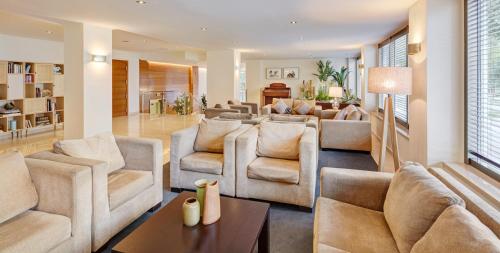 Гостиная зона в Sercotel Los Llanos