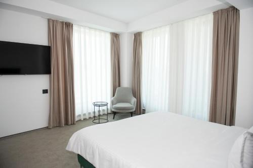 TV a/nebo společenská místnost v ubytování CM111Apparthotel