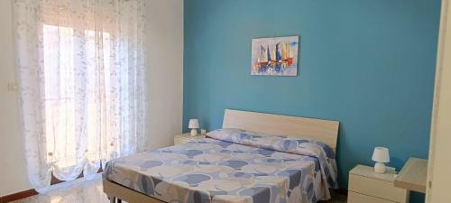 Postel nebo postele na pokoji v ubytování Zá Cicciuzza "Casa vacanza"