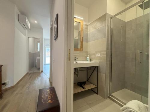 a bathroom with a sink and a shower at Il Sigillo in Trieste