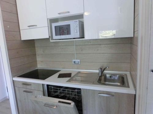 Η κουζίνα ή μικρή κουζίνα στο Apartments in Bibione 34317