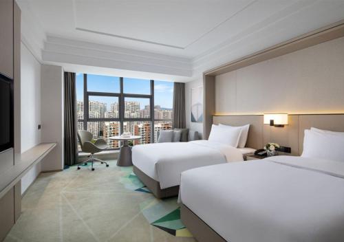 Katil atau katil-katil dalam bilik di Holiday Inn Ningde Dijing by IHG