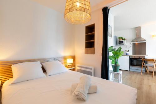 Tempat tidur dalam kamar di Point d'Or