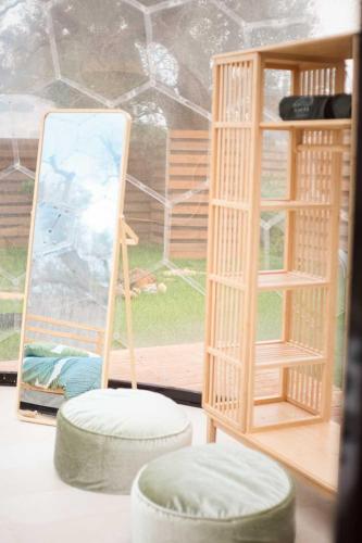 a toy room with a chair and a mirror at Folià - Natural Experience in San Vito dei Normanni