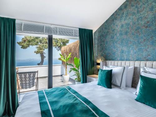 Postel nebo postele na pokoji v ubytování Hillora Hotel Buyukada