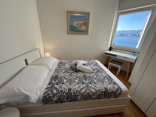 Posteľ alebo postele v izbe v ubytovaní Pool Apartment Galeb