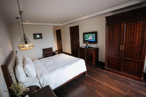 TV a/nebo společenská místnost v ubytování Paradise Soc Son Resort