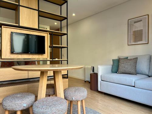 Light-Filled Apartment with Garden • Downtown