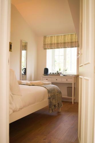 Lemon Tree Rooms - Newly Refurbished Coastal Stayにあるベッド