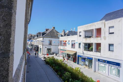 a view of a street in a city with buildings at -LE BOUDOIR- Elegant T2 Concarneau hypercentre in Concarneau