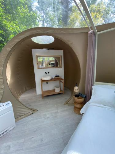 Postel nebo postele na pokoji v ubytování Glamping I Mulini