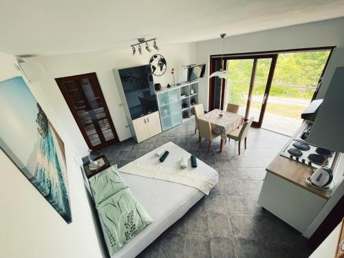 Postel nebo postele na pokoji v ubytování Apartments Kordić