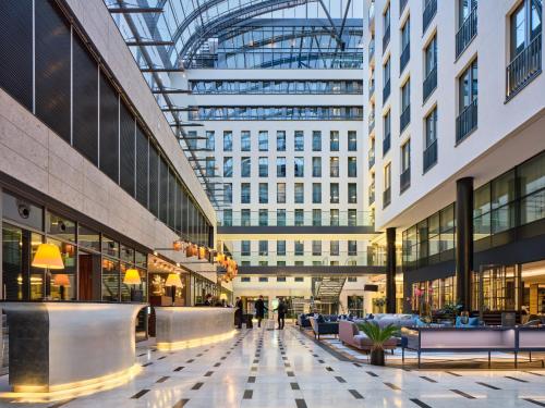 a view of a shopping mall with a glass ceiling at Hotel Kö59 Düsseldorf - Member of Hommage Luxury Hotels Collection in Düsseldorf