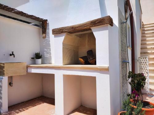 a room in a house with a bed in the middle at Da Lorenza di Casa Camilla Journey in Depressa
