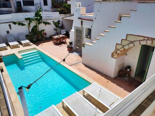 an overhead view of a swimming pool in a house at Da Lorenza di Casa Camilla Journey in Depressa