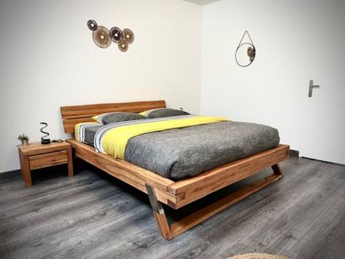 Ένα ή περισσότερα κρεβάτια σε δωμάτιο στο Appartement chaleureux 3 étoiles