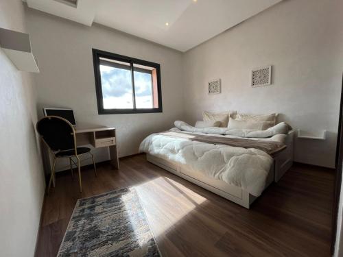 Ένα ή περισσότερα κρεβάτια σε δωμάτιο στο Lovely family condo in residence Marrakech