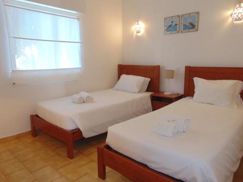 Posteľ alebo postele v izbe v ubytovaní Vilas Marrocha