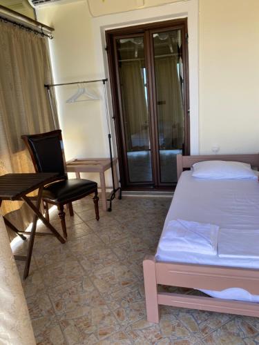 Ένα ή περισσότερα κρεβάτια σε δωμάτιο στο Vervekis Apartments