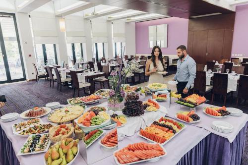 a table filled with lots of different types of food at Ilirija Resort Hotel Adriatic in Biograd na Moru