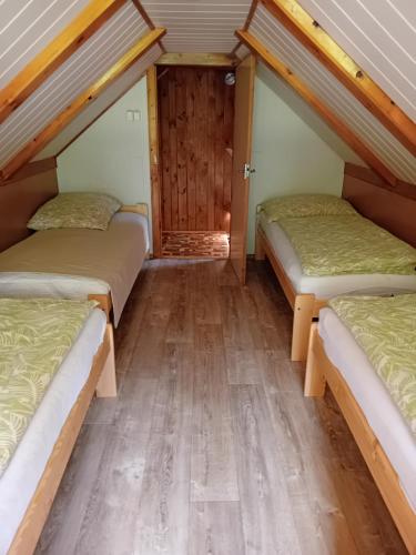 Postel nebo postele na pokoji v ubytování Chata Gerlinda