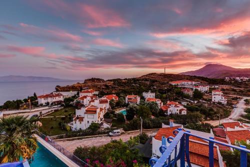 a view of a town with a sunset at Datca Villa Asina in Datca