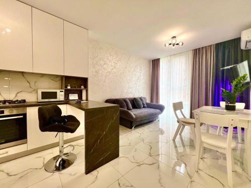 Кухня или мини-кухня в Apartments VIP AVALON
