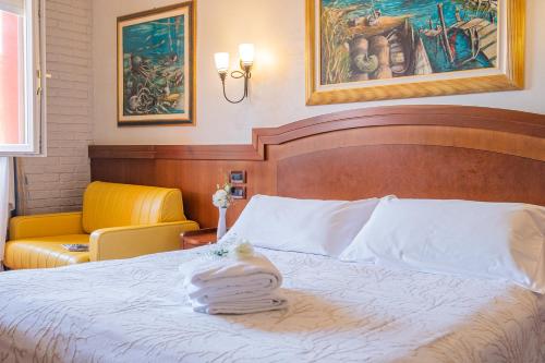 Letto o letti in una camera di Art Hotel Santa Lucia