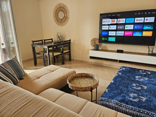 TV a/nebo společenská místnost v ubytování KRAKEN Apartment