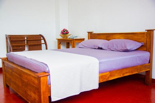 Postel nebo postele na pokoji v ubytování SkyAvenue Guest House