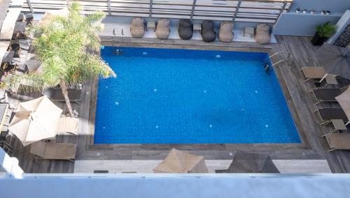 an overhead view of a swimming pool in a building at Medusa Apartments in Rethymno Town