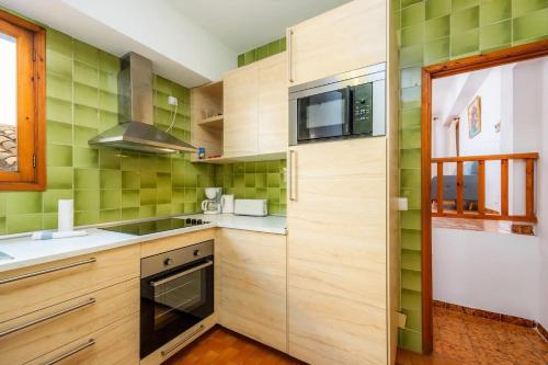 Η κουζίνα ή μικρή κουζίνα στο Apartamento Voramar MHM Cala Bona