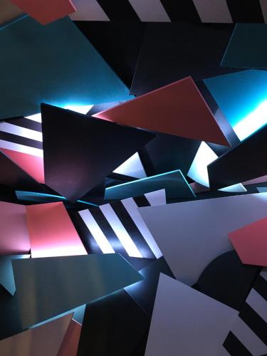 a bunch of papers sitting on a floor with lasers at ART B&B in Blackpool