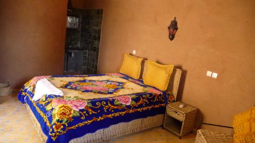 En eller flere senge i et værelse på Relais Hamada Du Draa