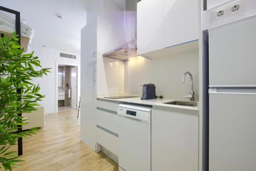 Una cocina o cocineta en Arena 20 Suites