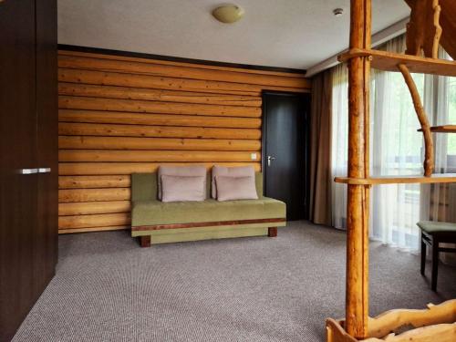 a bedroom with a bed with two pillows on it at Complex Hyzhky in Yaremche